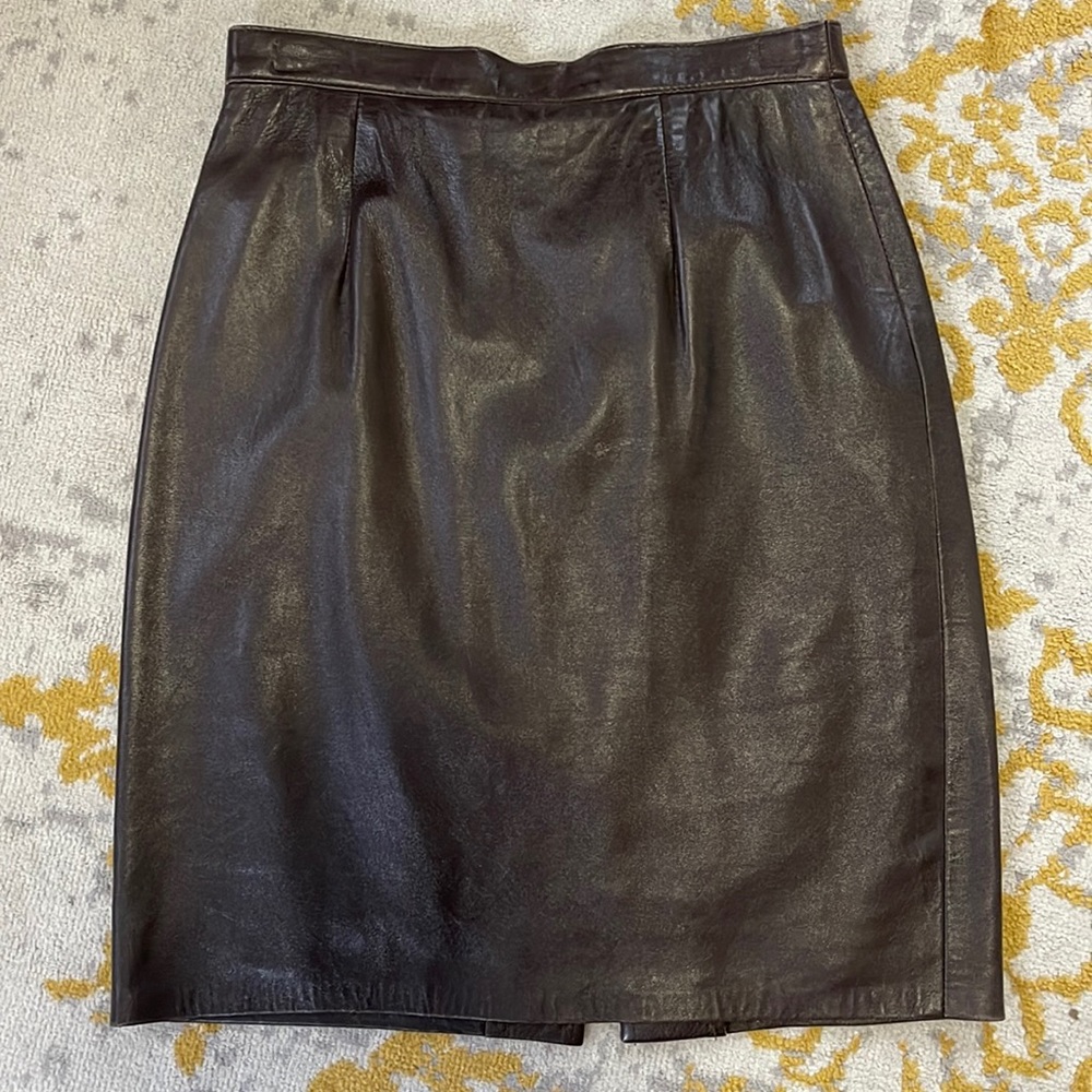 Vintage brown leather skirt. Well made, with little wear shown in pics.